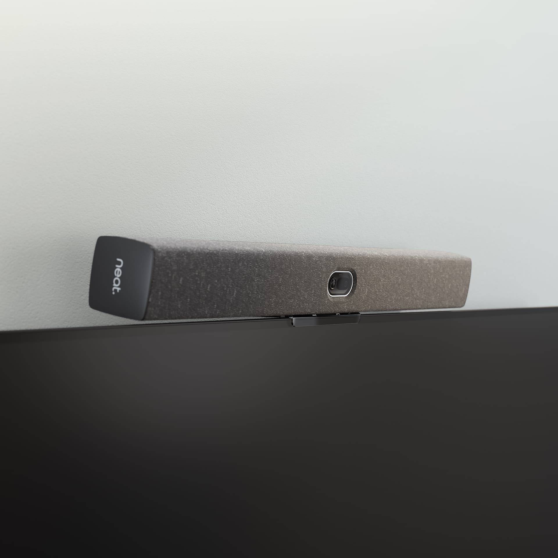 Neat Bar generation 2 mounted above a screen